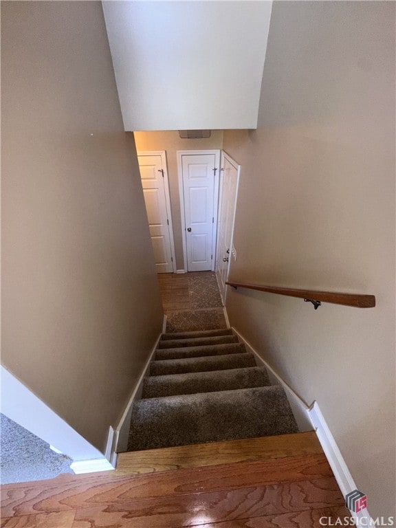 stairway with baseboards