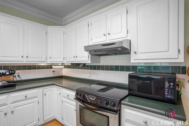 1130 Latham Dr, Watkinsville, GA 30677 - kitchen with black microwave, stainless steel range with electric stovetop, under cabinet range hood, dark countertops, and white cabinets