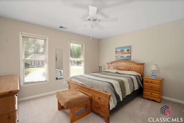 1130 Latham Dr, Watkinsville, GA 30677 - bedroom featuring light carpet, baseboards, and a ceiling fan