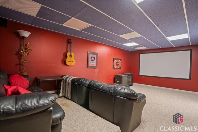 1130 Latham Dr, Watkinsville, GA 30677 - home theater with carpet floors, a paneled ceiling, and baseboards
