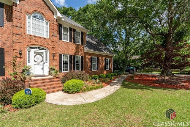 1130 Latham Dr, Watkinsville, GA 30677 - view of front of property with brick siding and a front yard