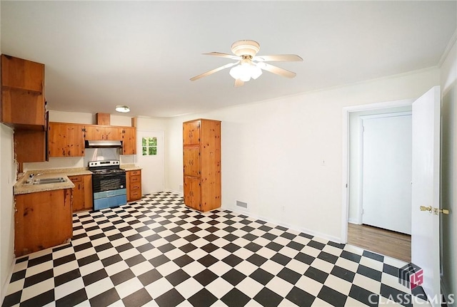 120 Hunt Rd, Athens, GA 30606 - kitchen featuring electric range, light floors, light countertops, under cabinet range hood, and a ceiling fan
