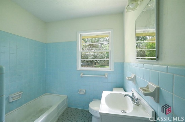 120 Hunt Rd, Athens, GA 30606 - full bath featuring vanity, wainscoting, toilet, tile walls, and a bathing tub