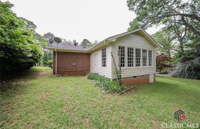 120 Hunt Rd, Athens, GA 30606 - rear view of house with a lawn and crawl space