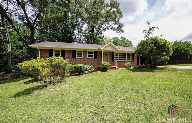 120 Hunt Rd, Athens, GA 30606 - single story home featuring brick siding, covered porch, and a front yard