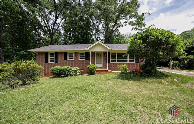 120 Hunt Rd, Athens, GA 30606 - single story home with brick siding, driveway, and a front yard
