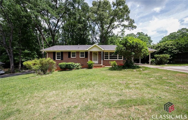 120 Hunt Rd, Athens, GA 30606 - ranch-style house with concrete driveway, brick siding, an attached carport, and a front lawn