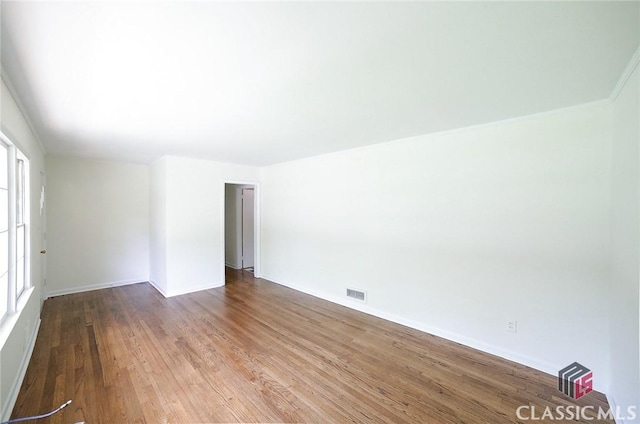 120 Hunt Rd, Athens, GA 30606 - empty room with baseboards, visible vents, and wood finished floors