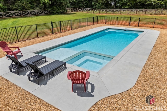 view of pool featuring a fenced backyard, an in ground hot tub, a fenced in pool, and a lawn