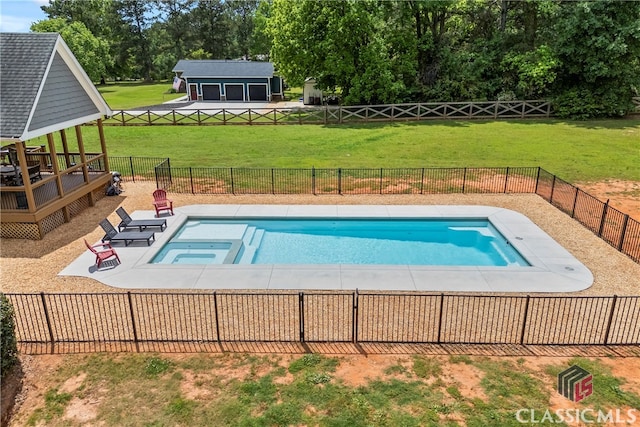 view of swimming pool with a patio area, a pool with connected hot tub, a lawn, and a fenced backyard