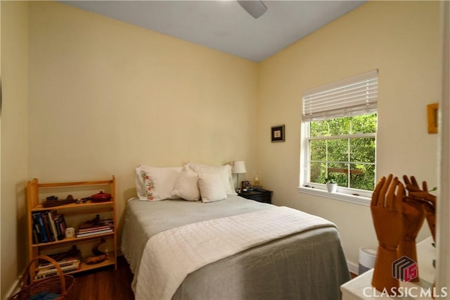 255 Pine Valley Dr, Athens, GA 30606 - bedroom with dark wood finished floors, a ceiling fan, and baseboards
