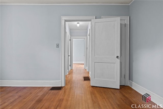 120 Mathews Ave, Athens, GA 30606 - spare room with crown molding, wood finished floors, and baseboards