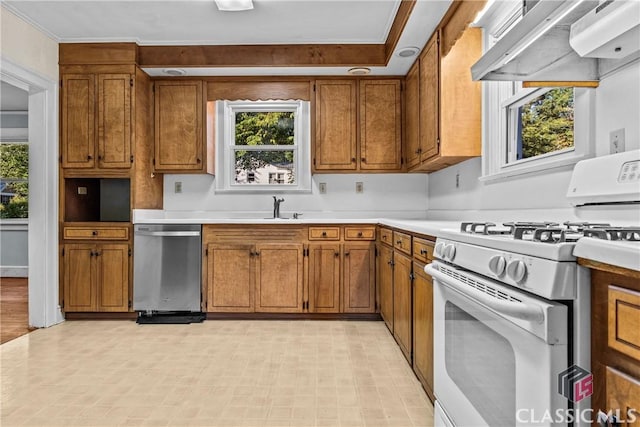 120 Mathews Ave, Athens, GA 30606 - kitchen with white gas stove, stainless steel dishwasher, extractor fan, brown cabinetry, and ornamental molding