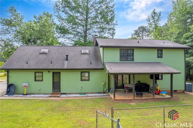 rear view of property with a patio, central air condition unit, and entry steps