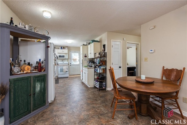 35 Good Hope Rd, Colbert, GA 30628 - dining room with a textured ceiling