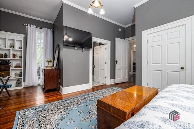 172 N Second St, Madison, GA 30650 - bedroom featuring ornamental molding, wood finished floors, baseboards, and a closet