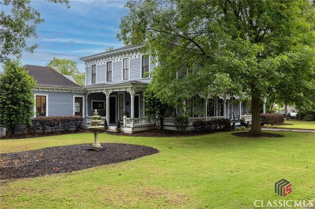 172 N Second St, Madison, GA 30650 - italianate-style house with covered porch and a front lawn