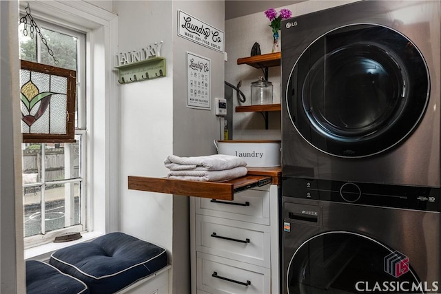 172 N Second St, Madison, GA 30650 - laundry room with estacked washer and dryer and cabinet space