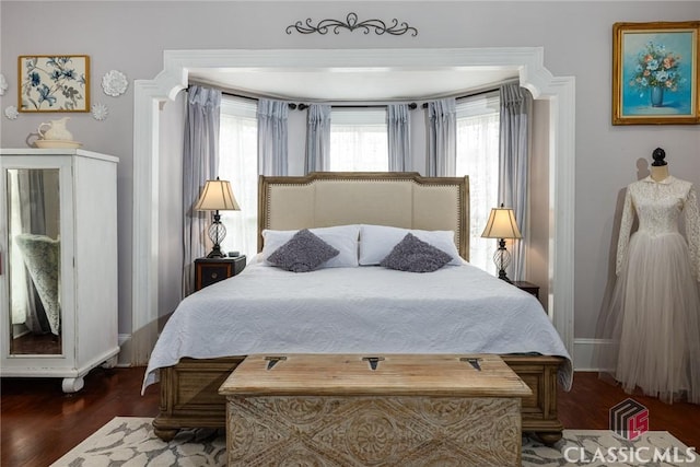 172 N Second St, Madison, GA 30650 - bedroom featuring wood finished floors and baseboards