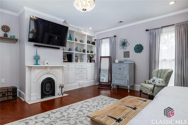 172 N Second St, Madison, GA 30650 - bedroom featuring dark wood finished floors, ornamental molding, baseboards, recessed lighting, and a fireplace