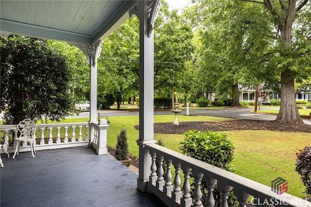 172 N Second St, Madison, GA 30650 - wooden deck with covered porch and a yard