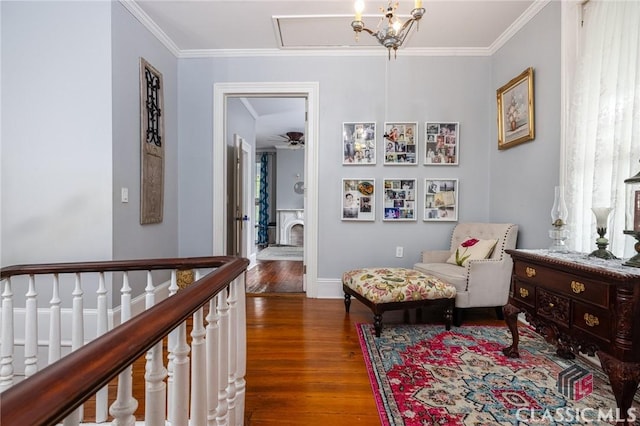 172 N Second St, Madison, GA 30650 - living area featuring wood finished floors, crown molding, and baseboards