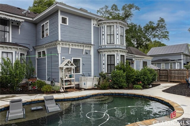 172 N Second St, Madison, GA 30650 - back of property featuring fence and an outdoor pool