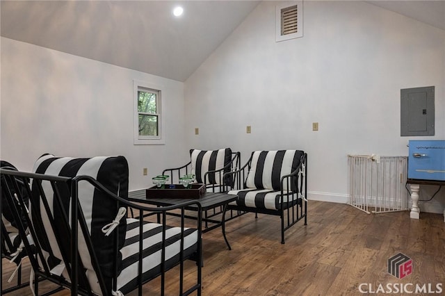 172 N Second St, Madison, GA 30650 - dining space with electric panel, wood finished floors, high vaulted ceiling, baseboards, and recessed lighting