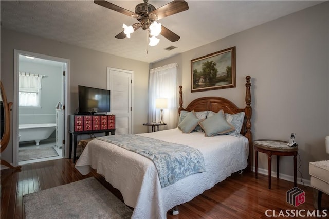 1181 Pete Dickens Rd, Bogart, GA 30622 - bedroom featuring wood finished floors, baseboards, a ceiling fan, and ensuite bath