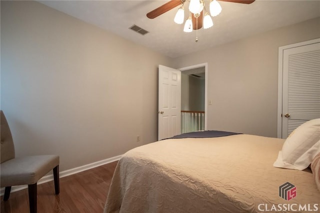 1181 Pete Dickens Rd, Bogart, GA 30622 - bedroom featuring dark wood finished floors, baseboards, and ceiling fan