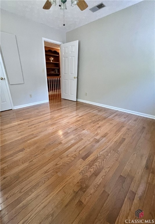 1181 Pete Dickens Rd, Bogart, GA 30622 - unfurnished room featuring ceiling fan and wood finished floors