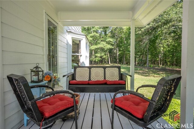 1181 Pete Dickens Rd, Bogart, GA 30622 - wooden deck featuring a porch