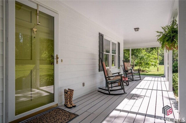 1181 Pete Dickens Rd, Bogart, GA 30622 - wooden terrace with a porch