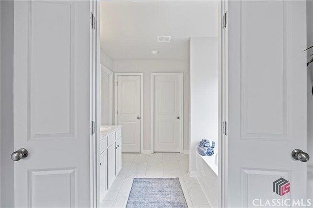 132 Water Oak Way, Crawford, GA 30630 - bathroom with a garden tub and vanity