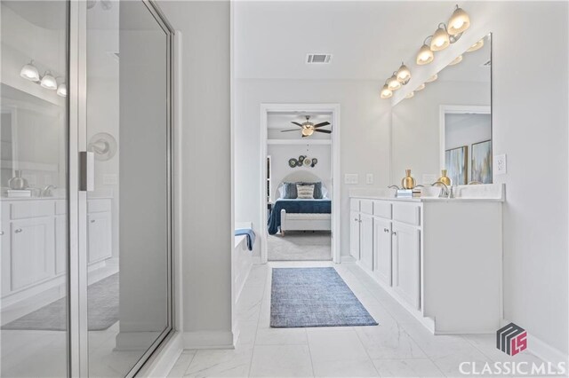 132 Water Oak Way, Crawford, GA 30630 - full bathroom featuring a ceiling fan, connected bathroom, marble finish floors, baseboards, and vanity