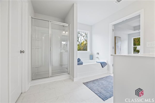 132 Water Oak Way, Crawford, GA 30630 - full bath with a stall shower, healthy amount of natural light, marble finish flooring, and a garden tub