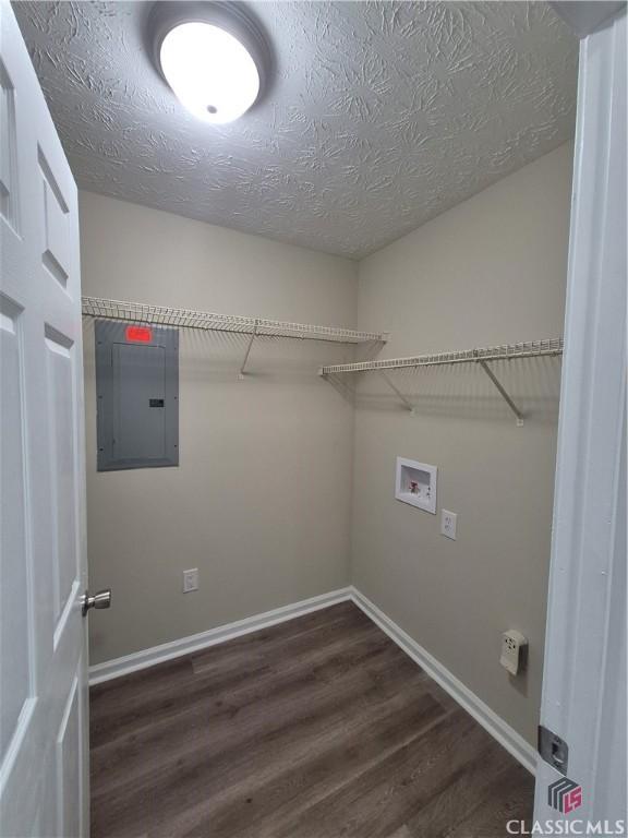 115 Big Oak Cir, Athens, GA 30605 - laundry area with electric panel, dark wood finished floors, baseboards, a textured ceiling, and hookup for a washing machine