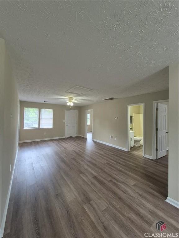 115 Big Oak Cir, Athens, GA 30605 - unfurnished living room with baseboards, a textured ceiling, wood finished floors, plenty of natural light, and ceiling fan