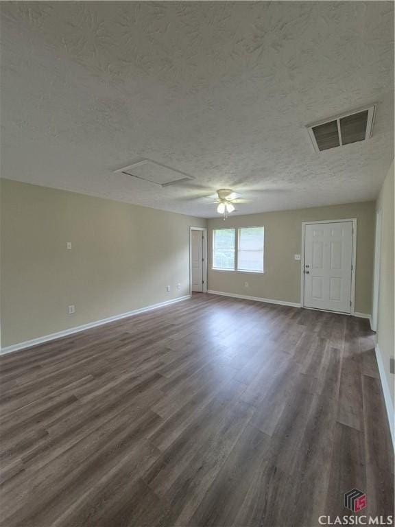 115 Big Oak Cir, Athens, GA 30605 - empty room featuring attic access, a textured ceiling, dark wood-type flooring, and baseboards