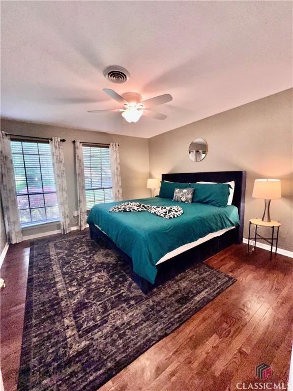 256 Cherokee Rdg, Athens, GA 30606 - bedroom featuring baseboards, wood finished floors, and a ceiling fan