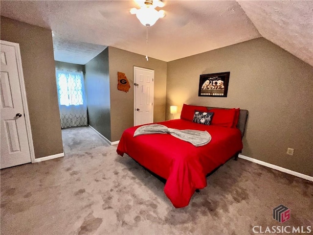 256 Cherokee Rdg, Athens, GA 30606 - bedroom with vaulted ceiling, carpet, baseboards, ceiling fan, and a textured ceiling