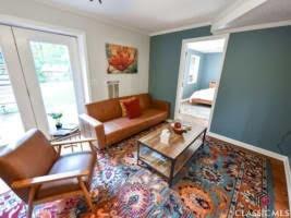 256 Cherokee Rdg, Athens, GA 30606 - living room with plenty of natural light, ornamental molding, and baseboards