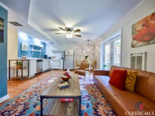 256 Cherokee Rdg, Athens, GA 30606 - living area with ceiling fan, wood finished floors, and crown molding