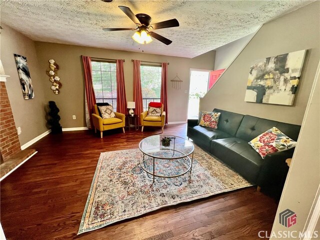 256 Cherokee Rdg, Athens, GA 30606 - living area featuring a textured ceiling, wood finished floors, ceiling fan, and baseboards