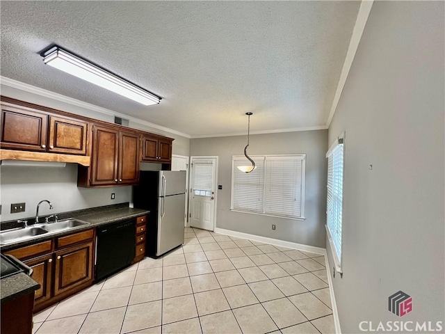 kitchen with dishwasher, freestanding refrigerator, dark countertops, a sink, and ornamental molding