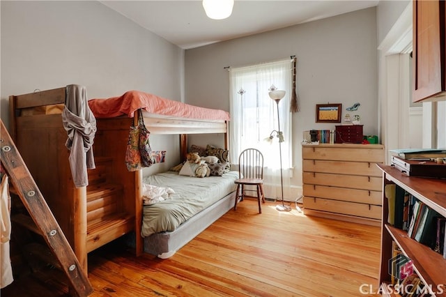 bedroom with light wood-style flooring