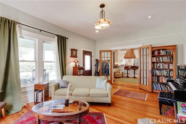 living area featuring light wood-style flooring