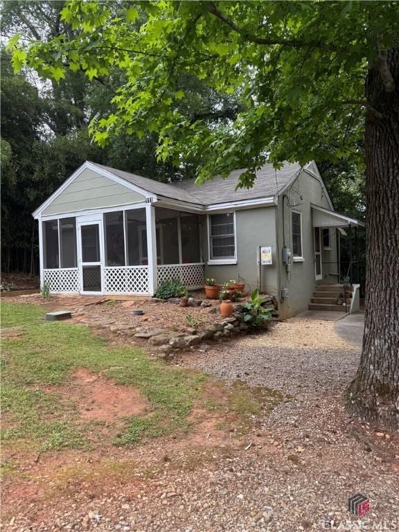 105 Hollie St, Athens, GA 30606 - view of front facade with a sunroom and roof with shingles