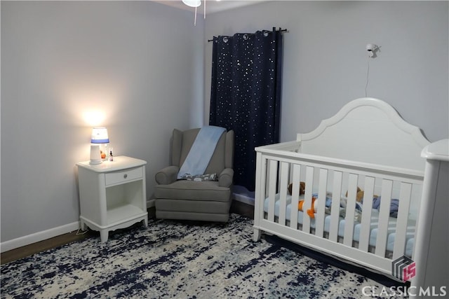 348 Jefferson River Rd, Athens, GA 30607 - bedroom featuring a crib and baseboards