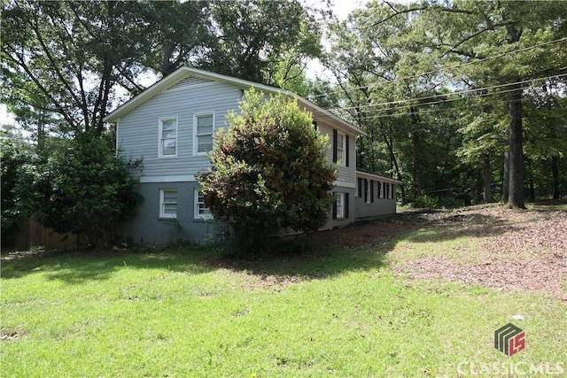 348 Jefferson River Rd, Athens, GA 30607 - view of property exterior featuring a yard and brick siding